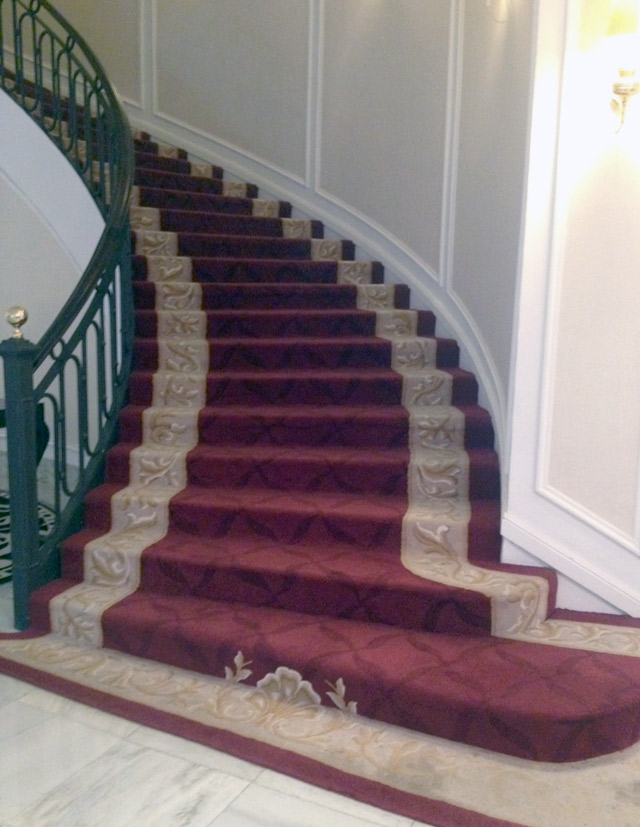 Dramatic Classic Red Carpeted Staircase