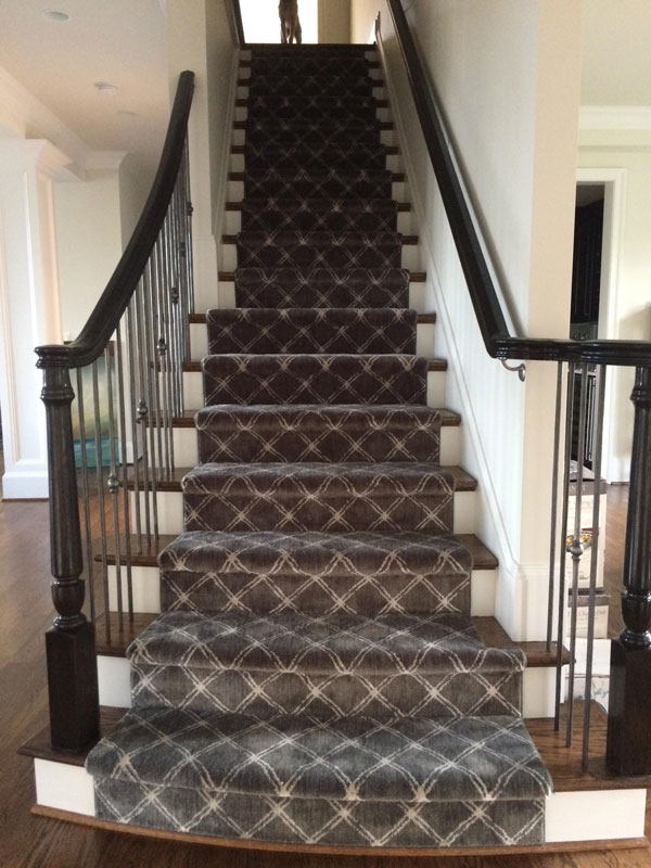 Modern Staircase with Patterned Grey and White Stair Runner Triangular Shapes