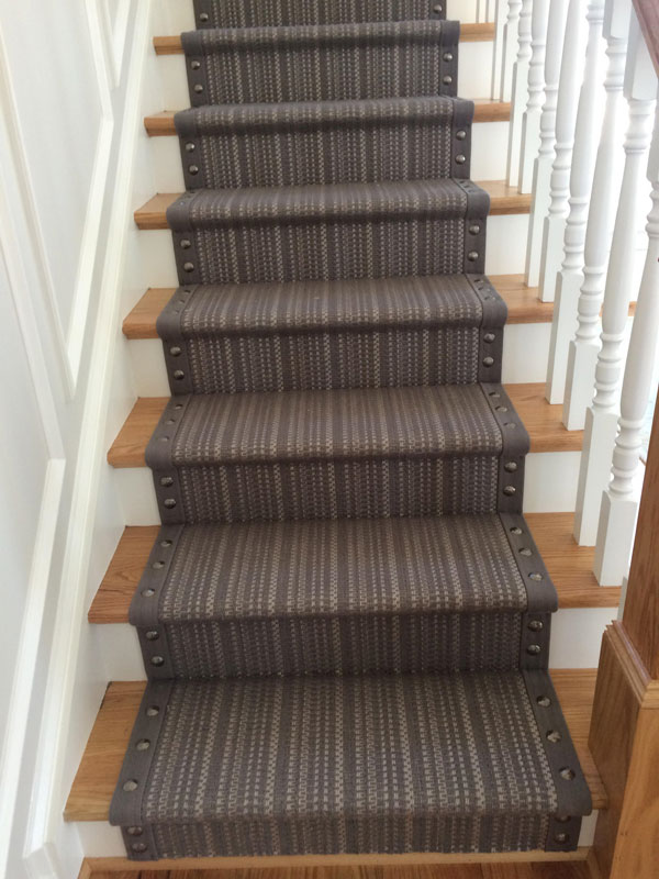 grey stripes on carpet with rivets by Farsh Carpets