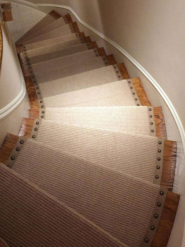 Light Neutral Stair Carpet with Rivets by Farsh Carpets