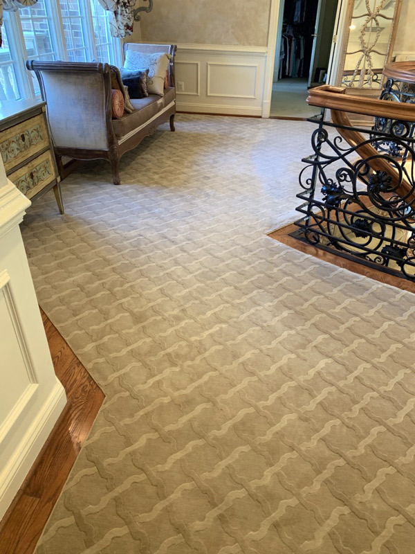 Elegant Custom Sitting Area Carpet at the Top of Stairs