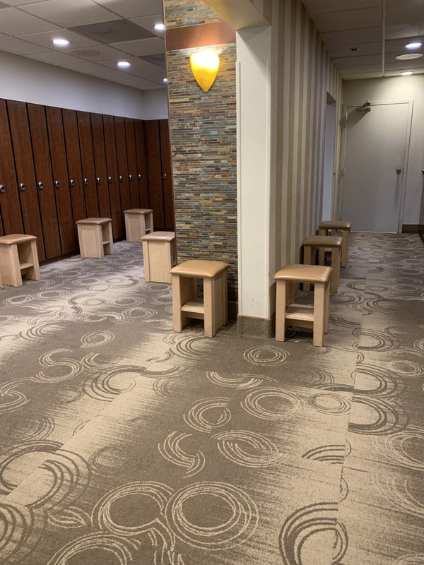 Commercial Locker Room Carpeting with Circle Elements by Farsh Carpets