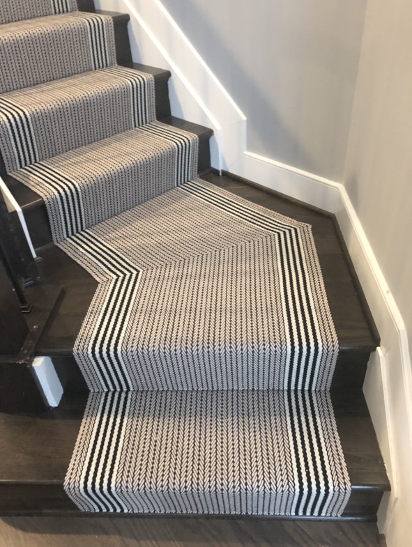 Thin and Thick Striped Neutral Stair Runner Installed With Odd Shaped Landing