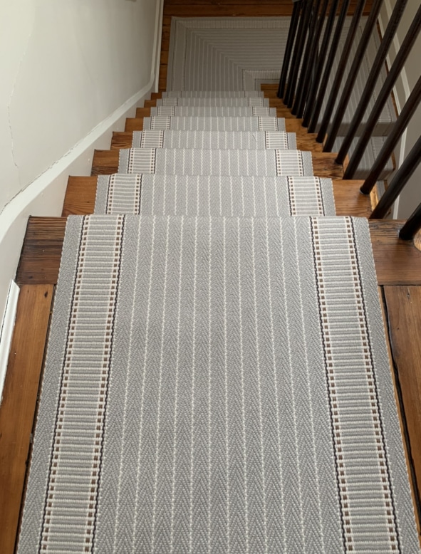 Grey Striped Carpeted Stair Runner Top and Landing Installed by Farsh Carpets & Rugs